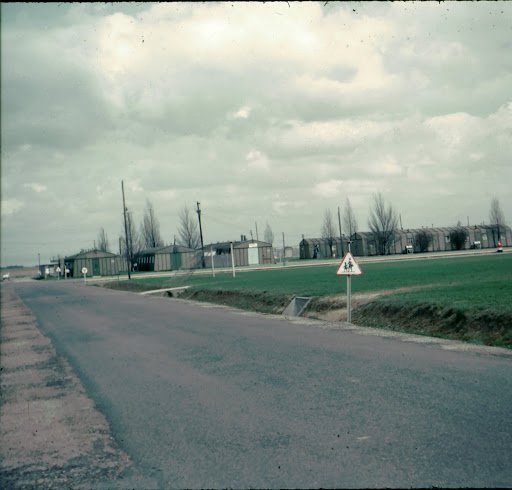 1963-April  Dreux Air Force Base road between work, hospital, post office, stores etc. buildings and officer housing area..jpg