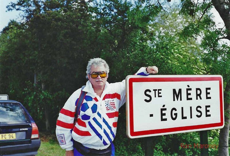 D day celebrations 1994 Ste Mere- Eglise copy 2.jpg - Ronald Maroney next to the St Mere Eglise sign 1994