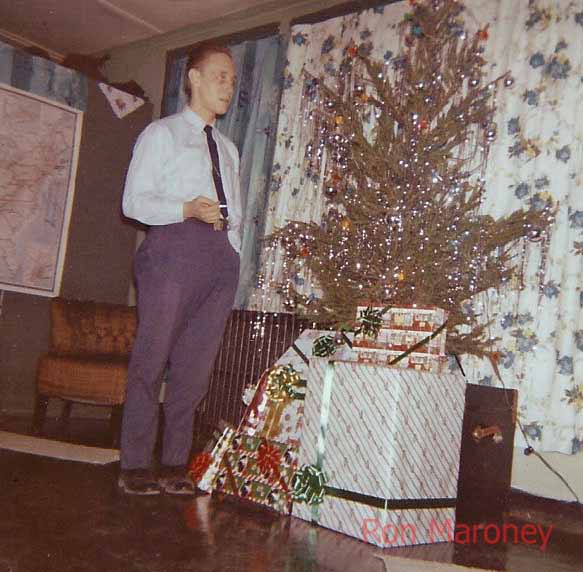 sssss.jpg - Joe Reder in front of gifts for French children