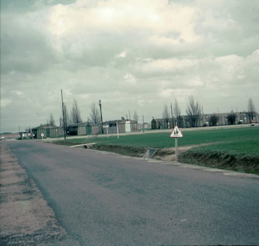 Apr 1963 Dreux Air Force Base road between work, hospital, post office, stores etc. buildings and base housing area..jpg