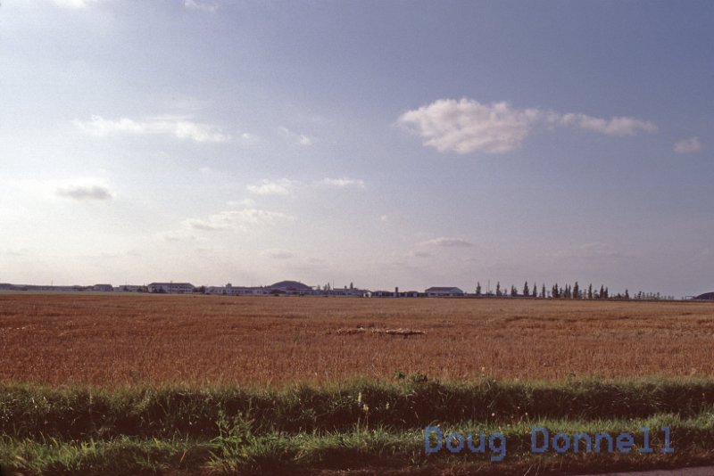 Slides-AC042.jpg - Distant View of Base - from margaritte 1 all the way to the wharehouses. 1978