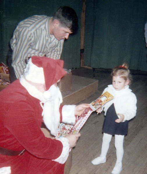 Xmas62-Santa.jpg - Dec 62- Santa was at Dreux!Giving something to my sister Susie.