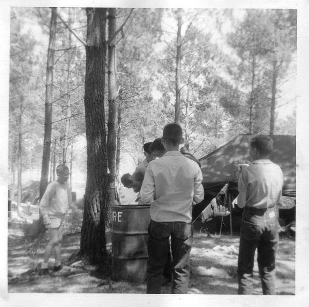 cazauxC2.jpg - Boy Scout camp at Camp Cazaux in southern France. Getting dunked in the fire barrel was something of a rite of passage -- seemed to happen to everyone at least once during the two weeks we were at camp. - Doug