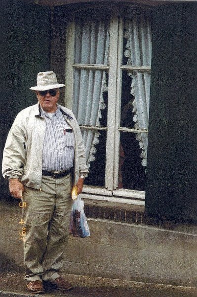 Scan_Pic0026.jpg - Buddy In front of Kitchen Window of the Apartment