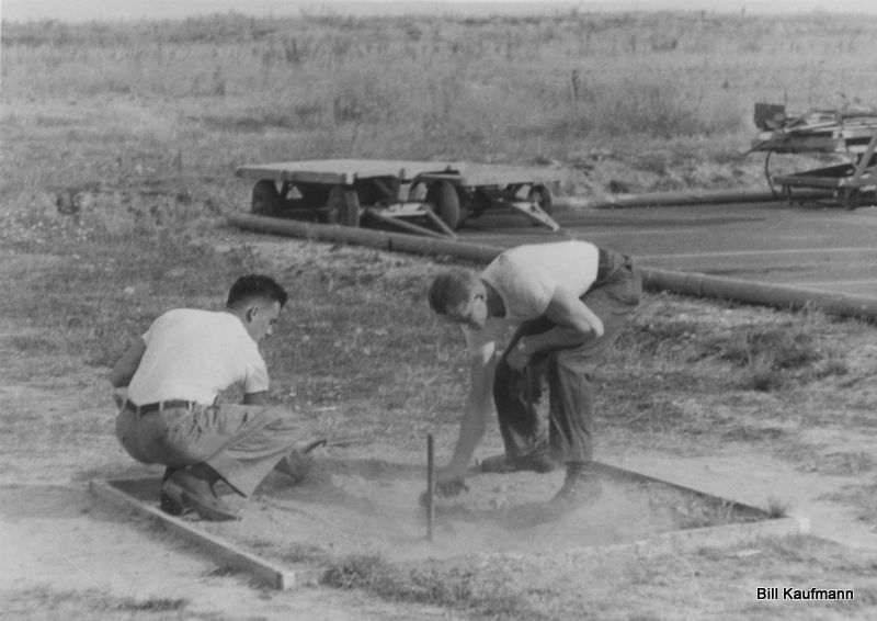 Playing horse shoes by field maintenance building   1958.jpg