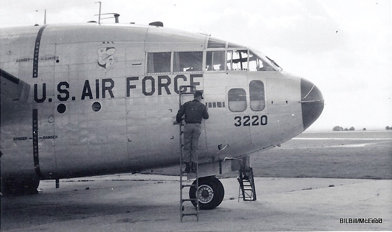 d 12c.JPG - East German Border Crew Putting Air Force Outstanding Unit Award on plane