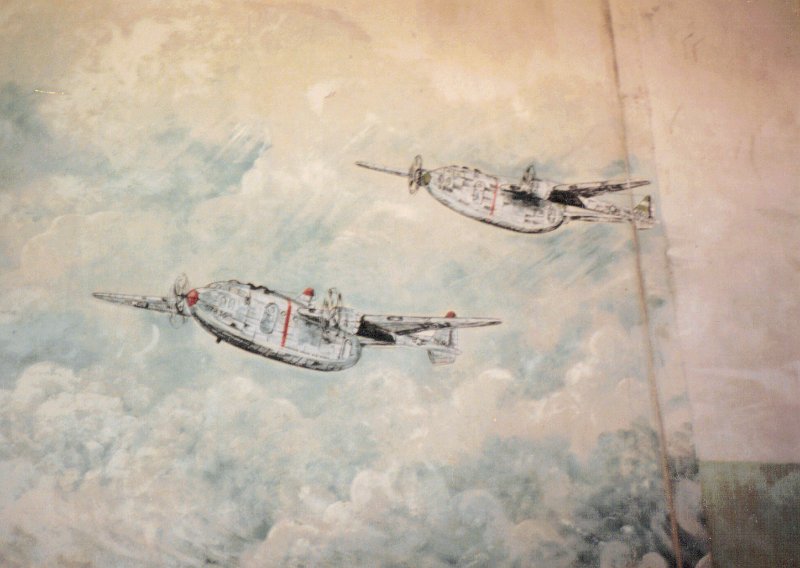 Dreux AB C 119 Mural at Mess Hall across runway at 24 end Aug 1987.JPG