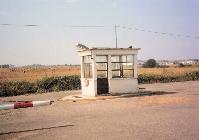 Main Base Guard Shack  Looking West to NCO Trailers 1987.JPG